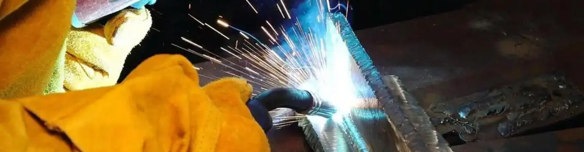 kales skilled welder on high strength steel structure